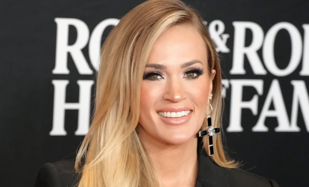 Carrie Underwood wows in metallic two-piece and must-see boots