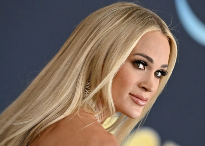 Carrie Underwood showcases toned legs in dazzling mini dress during extra special concert