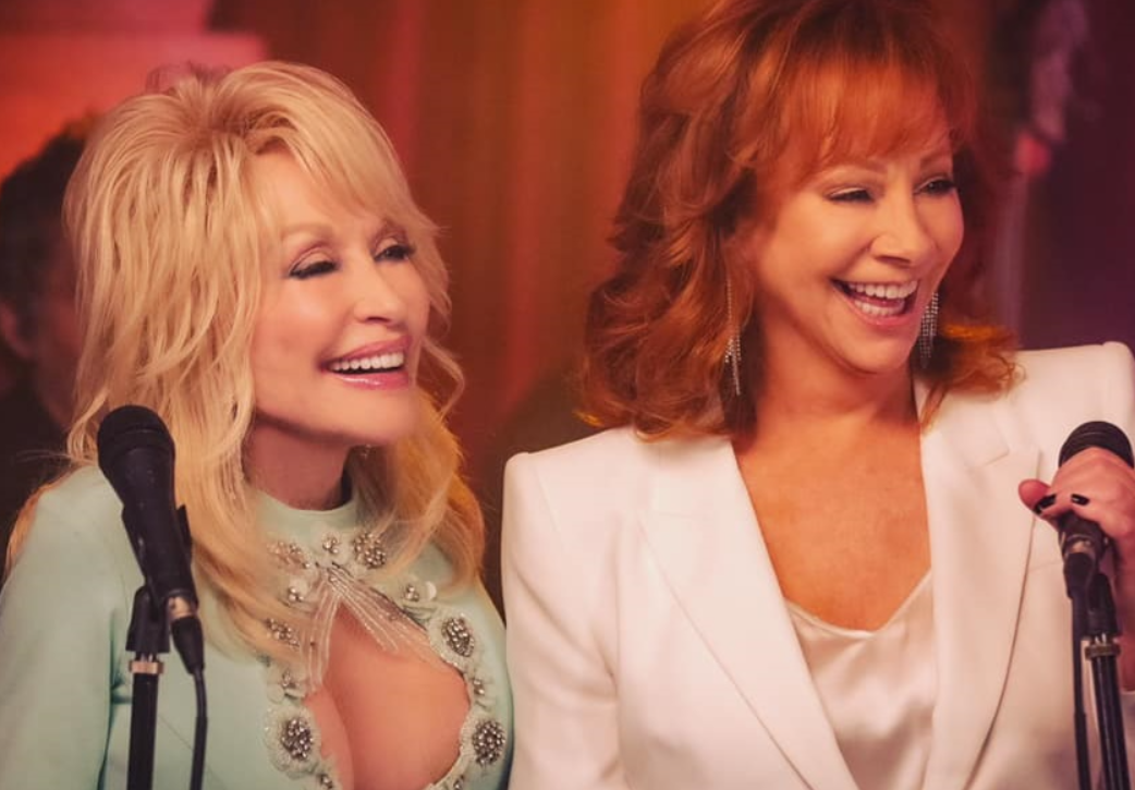 Reba & Dolly Make History with Breathtaking Duet of ‘Does He Love You