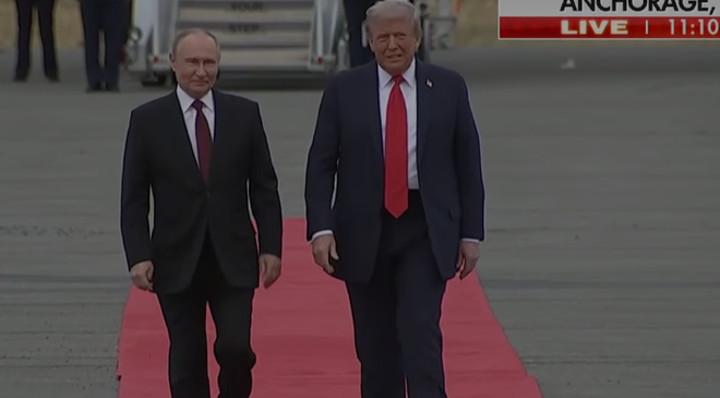 Trump and Putin greet each other, shaking hands on the tarmac ahead of talks