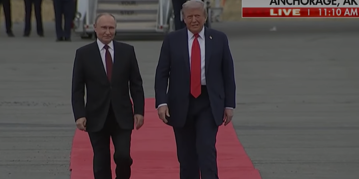 Trump and Putin greet each other, shaking hands on the tarmac ahead of talks