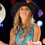 Lainey Wilson’s “Heart Skipped A Beat” After Learning About CMA Entertainer Of The Year Nod