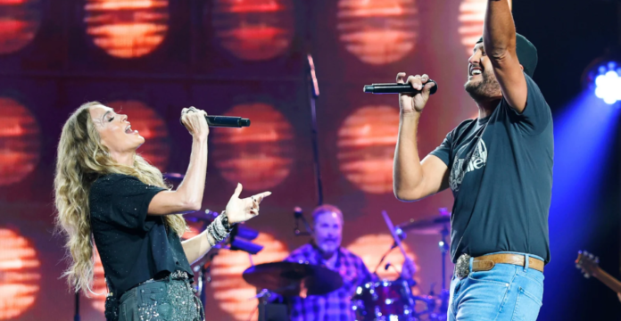 Carrie Underwood and Luke Bryan performing a 90s country cover