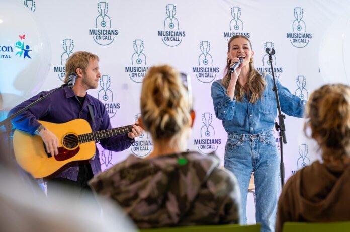 Kelsea Ballerini supports program at Dolly Parton's hospital.